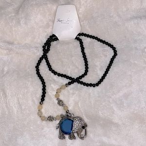 Blue stone elephant pendant necklace
